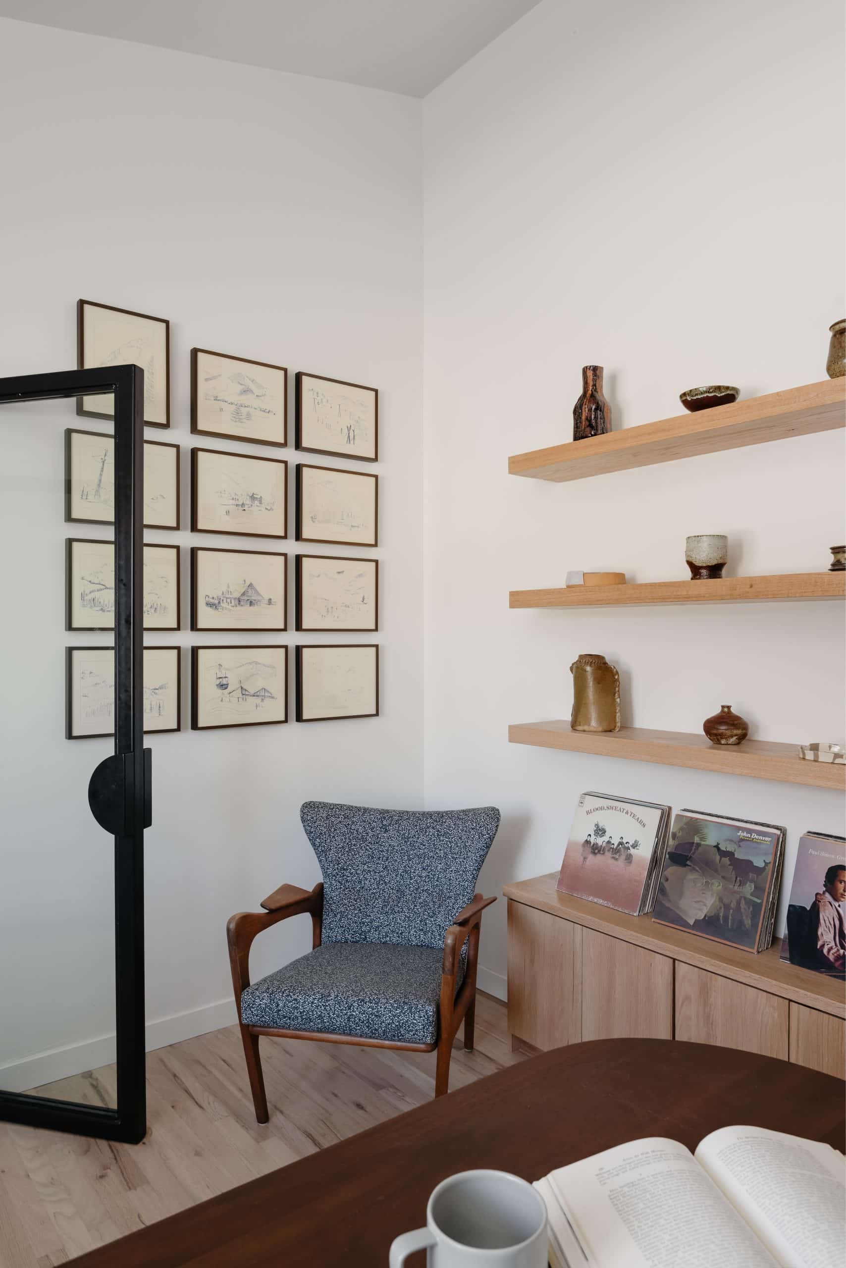 Office wall styled with framed art